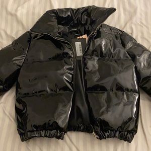 Blacked cropped vinyl puffer jacket.